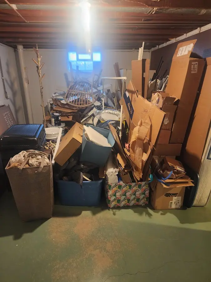 Roll-off dumpster container at job site for Yard Waste Dumpster Rental in Hillside